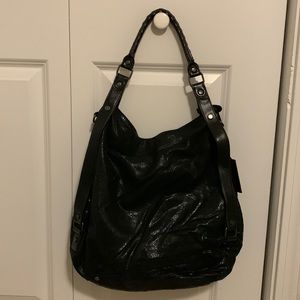 Black Kenneth Cole Reaction shoulder handbag.